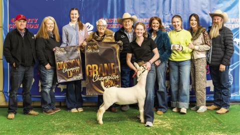 Ritzy Millican is pictured with her Grand Champion Goat at this year’s Castro County Junior Livestock Show.