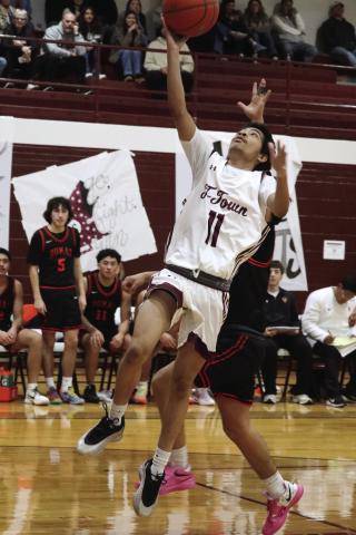 Elijah Wonzo goes in for a layup