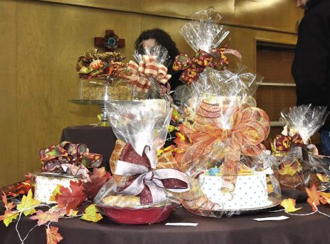 TIE 'EM DOWN--Desserts so light and delightful that they could well float away will be offered for purchase at auction at the 15th annual Samaritan Hospice Dessert Auction and Brisket Dinner Tuesday, November 25 beginning at 6 p.m. in the Lamar Room of King's Manor. (Photo by Jim Steiert)