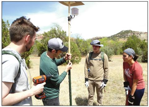 WTAMU Dr. Erik Crosman, second from left, and students Glen Schneider, Cristian Campos and Monica Ghosh install weather sensors in Palo Duro Canyon State Park in 2021. The sensors are being used now for a second year in a study of extreme temperatures on the canyon floor. (photo courtesy of WTAMU)