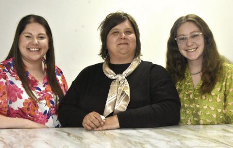 RUNNING NEW FSA OFFICE--These lovely ladies make the new Farm Service Administration office at 1500 West Park Avenue run. At center is Lori Johnson, who grew up a Hereford girl, although she lives at Nazareth now. She is the FSA County Executive Director. To Mrs. Johnson's left and right are Program Analysts Bailey Urbanczyk and Tay Criswell. (Photo by Jim Steiert)