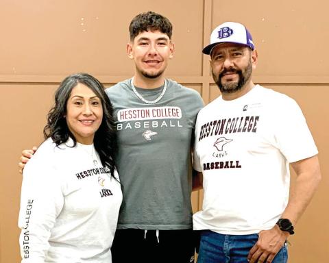 Dimmitt senior Mario Lopez signed with Hesston College in Kansas to play baseball for the Larks.