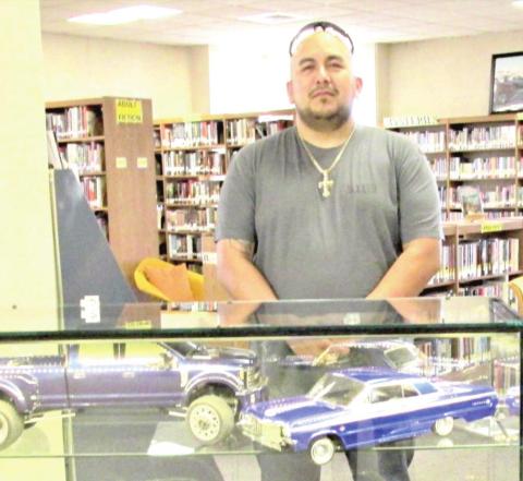 January Display of the Month is Sam Cavazos with remote control 1964 Chevy Impalas and F450 pickups.