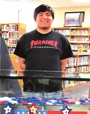 DHS Mykhal Diaz is the Rhoads Memorial Library Displayer of the Month for May.