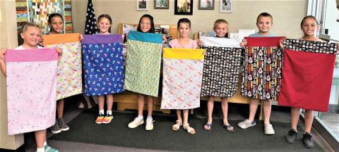 Castro County 4-Hers attended a pillowcase making workshop last Thursday morning. Eight youth attended to learn about their sewing machines, sew straight line, picked out accent and main fabrics, banding hidden seams, and French seams.