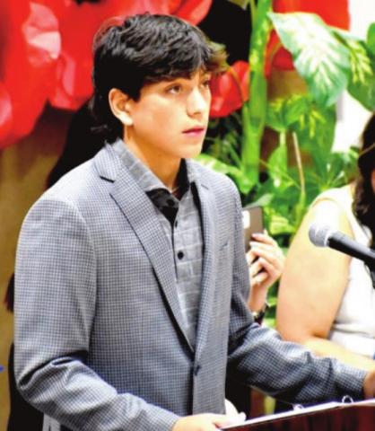 Will VanZee led the Pledge of Allegiance.
