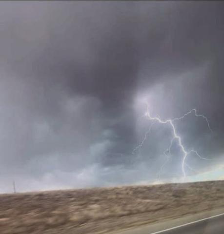 STORMY FIRE STARTER-Clouds rumbled thunder and unleashed a brief windlashed shower on Hereford May 14, then moved eastward bearing only dry lightning that sparked multiple wildfires, including the 34,000 acre Hungate Fire in Randall County that threatened Canyon and Happy.