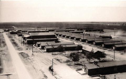 NORTHWEST PERSPECTIVE—A view to the northwest including the hospital structure at the Hereford POW camp.