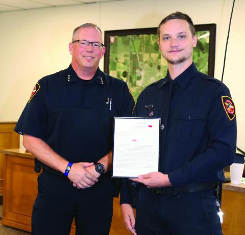 Tulia Police Chief Paul Brown presented Officer Carson Kisselburg with a Life Saving Award for his actions during the explosion on August 4, 2026.