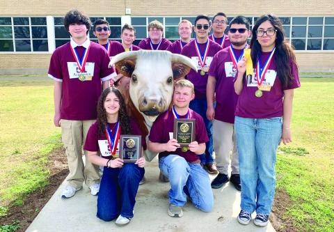 2026 HHS UIL Academic team outside the high school, surrounding the mascot.