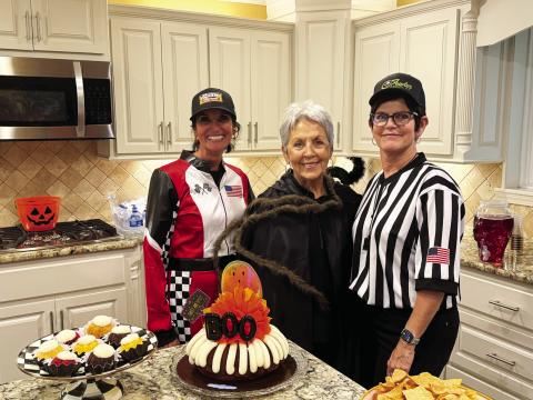 La Madre Mia hostesses for their recent Halloween party and sealed bid auction pictured left to right are: Kathie Kerr, Judy Williams and Teresa Allen. (BRAND Photo By Angela Blackmon)