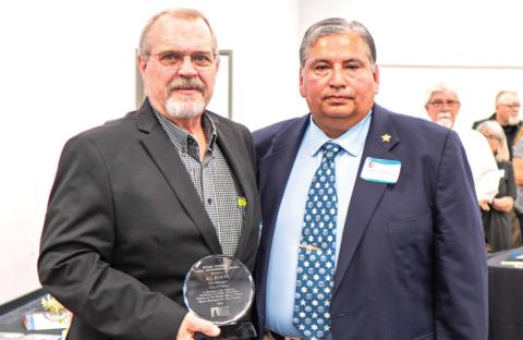 As one of his last duties as PRPC Chairman of the Board of Directors, Castro County Sal Rivera presented former Dimmitt city manager BJ Potts (now Tulia city manager) with the Beelee Goodwin Award at the 2024 PRPC Annual Meeting and Banquet held at the First Responders Academyon Sept. 26 in Amarillo. Rivera will continue to serve on the PRPC Executive Board.