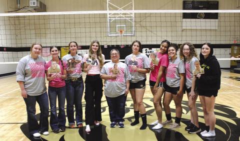 Kelton’s volleyball team honored breast cancer survivor, Maria Garza at the Pink Out game, last week. Her fight is our fight, and we can’t wait until we get to see her everyday at school again! (Courtesy Photo)