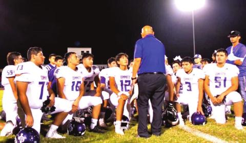 The Dimmitt Bobcats with Coach Johnny Nino following their win against Sunray. (Photo by Crystal Nino)