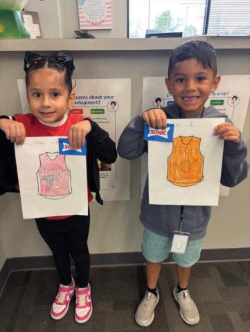 Camilla Silva and Harlem Aleman (K-2nd top boy and girl winners)