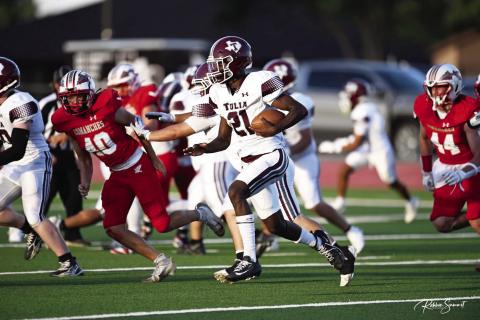 Zai’Brien Frost looks down the field for some running room.