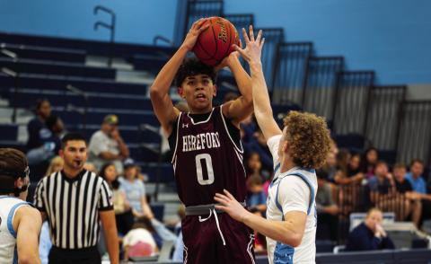 Pierce Valdez (0) plays against West Plains. The Whitefaces lost 72-41 to Estacado in the Caprock Tournament Monday. Both the Lady Herd and the Hostile Herd host Pampa Jan. 6 in district play.