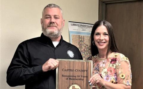Castro County Judge Mandy Gfeller accepted a plaque recognizing Castro County as a 50-year member of the Texas Association of Counties Risk Management Pool on Monday during Commissioners Court.