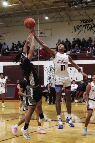 CJ Parker and Gavin Mahannah battle for the rebound