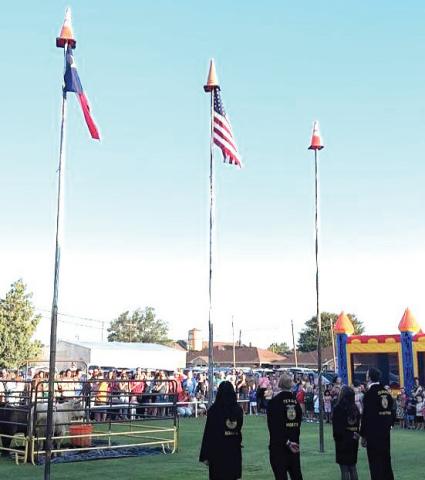 Nazareth ISD FFA chapter had its time honored raising of the flag ceremony on the first day of school, along with some bounce house fun and even a couple of steers gracing the lawn in front of the high school.