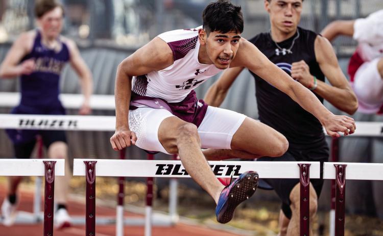 Two Hereford Whitefaces have advanced to the UIL State Track and Field Championships Thursday, May 14 in Austin. Izak Dominguez (left) won the 110-meter hurdles event with a time of 13.87 seconds at the Regional Track Meet in Lubbock setting a Region I-4A record. Brix Machen (below) cleared a height of 6-feet, 8-inches to win second place at the Region Meet and qualify for state.