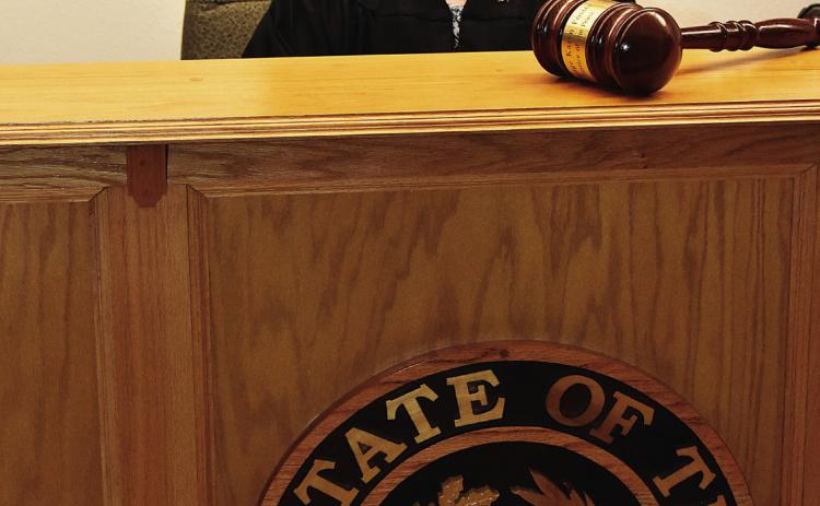 LAYING DOWN THE BIG GAVEL--Karen Boren is retiring from office as Justice of the Peace for Deaf Smith County effective Tuesday, March 31 and will be honored with a reception from 1:30 to 3:30 p.m. that day on the third floor of the Deaf Smith County Courthouse. Mrs. Boren, the lady of the law north and south of the Tierra Blanca, has served just under 41 years in law enforcement and as a JP in Deaf Smith County. (Photo by Jim Steiert)