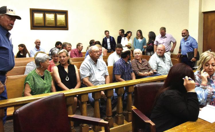 CROWD ON HAND--A large crowd of county and city residents was on hand in the County Courtroom of the Deaf Smith County Courthouse at the June 23 county commission meeting to hear and observe county commissioners give technology giant Google LLC and its affiliates along with IP Roman Gas property tax abatements on potentially billions of dollars worth of projects in Deaf Smith County over the next decade in return for substantial payment in lieu of taxes. (Photo by Jim Steiert)