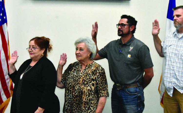 SWEARING IN CEREMONY--Newly elected and re-elected city commissioners were sworn in during a special city commission meeting on May 11 at City Hall. Taking the oath of office from left are incumbent City Commissioner Place 2 Angie Alonzo, newly elected At-Large Commissioner Place 6 Margaret Del Toro, newly elected City Commissioner Place 4 Jeremy Lopez, and incumbent At-Large Commissioner Place 5 James Stow. They were sworn in by City Secretary Franchesca Jimenez.