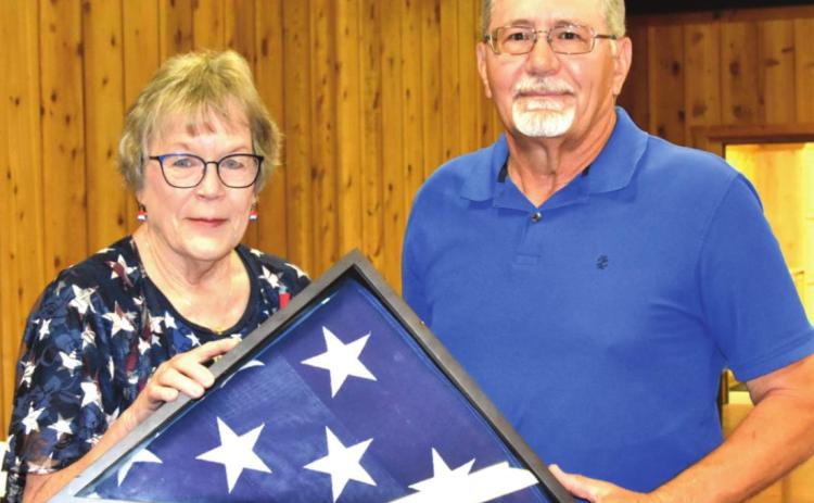 Nazareth Post 528 Commander Clyde Schulte and Angie Milton of the American Legion Auxiliary presented an encased wall hanging flag to the family of William C. “Junior” Hochstein.