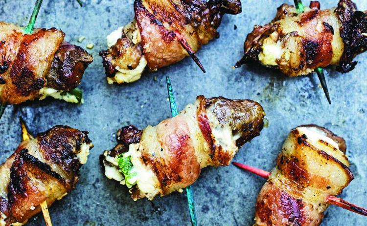 OPENING DAY CLASSIC--Dove poppers, made with the two sides of dove breast, cream cheese tucked into a half jalapeno and wrapped in thin bacon are an opening day classic Texas taste treat as dove season begins.