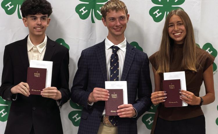 At Sunday’s Deaf Smith County 4-H Banquet I Dare You Awards were presented to (above, from left) Max Hedrick, Sam Detten and Macy Betzen. Right, Max Hedrick and Andrew Mathews were awarded Gold Star Awards.