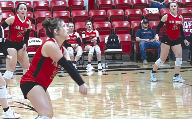 Varsity Lady Cougar, McCauley Jernigan, passes the ball in their win over Wildorado.