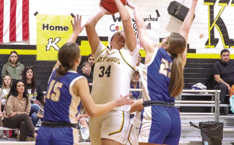 The Nazareth Swiftettes topped Kress 52-12 Friday night. Above, Madison Brockman (15) and Lexi Ramaekers (25) go for the steal against the Lady Roos. (CCN photo)