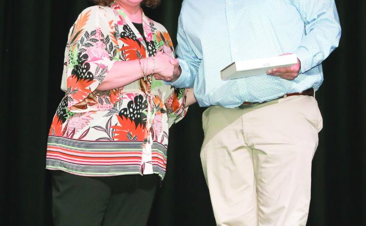 Mrs. Robin Salazar presented the Plainview Herald’s Tomorrow’s Leader Award to Luke Moore.