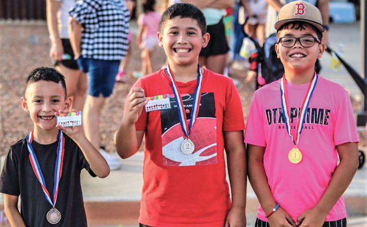 Winners of the DISD Snack Pak 4 Kids Bike-A-Thon held last week were Ulysses Hernandez, Judias Aguero and Kyle Grado.