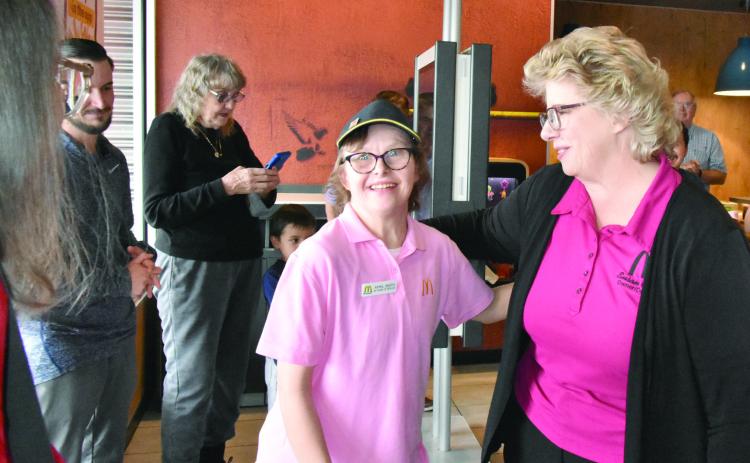 WHAT A SURPRISE--April Smith's face lights up as she realizes that a reception was being held in her honor at the McDonald’s restaurant at 1112 West First recognizing her 30 years of service there. Among those on hand from left are Jake Spears, 'people manager' at the local establishment, April's Mom Taryn Smith, April, and Susan Credle, owner/operator of the two McDonald's in Hereford. (Photo by Jim Steiert)