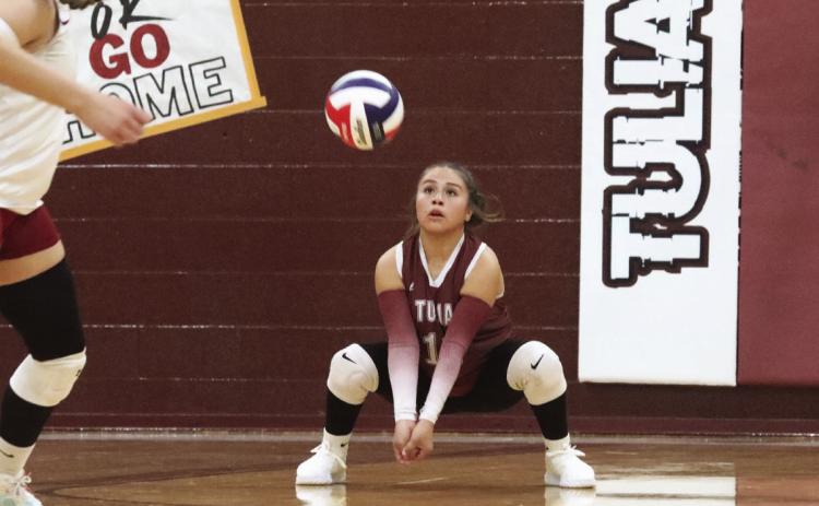 Mariah Briones returns the ball