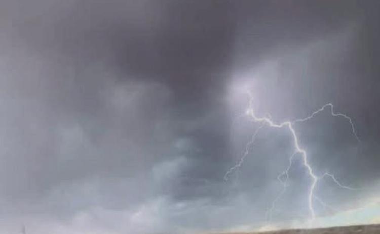 STORMY FIRE STARTER-Clouds rumbled thunder and unleashed a brief windlashed shower on Hereford May 14, then moved eastward bearing only dry lightning that sparked multiple wildfires, including the 34,000 acre Hungate Fire in Randall County that threatened Canyon and Happy.