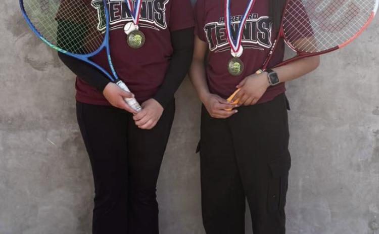 Brynndall Bell and Bella Leal won the B Girls Doubles Draw at the Wolfpack Junior High Tournament last week.