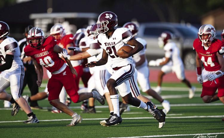 Zai’Brien Frost looks down the field for some running room.
