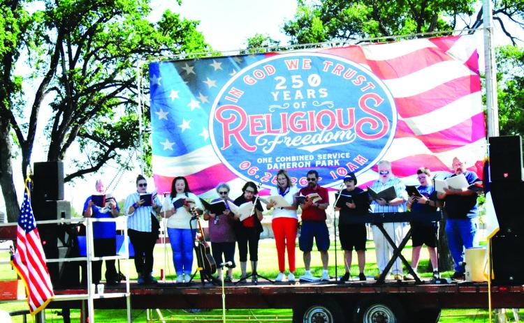 A choir of combined voices from Hereford churches brought depth and feeling to joint worship in Dameron Park.